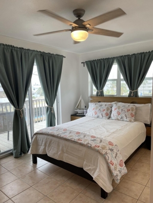 Primary Bedroom with One Queen Bed & Bathroom